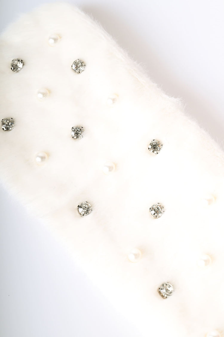 Fascia per capelli in faux fur con strass