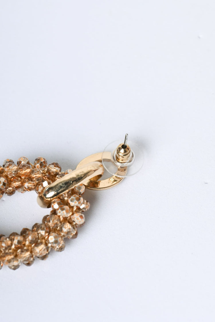 Orecchini a ovale con perline