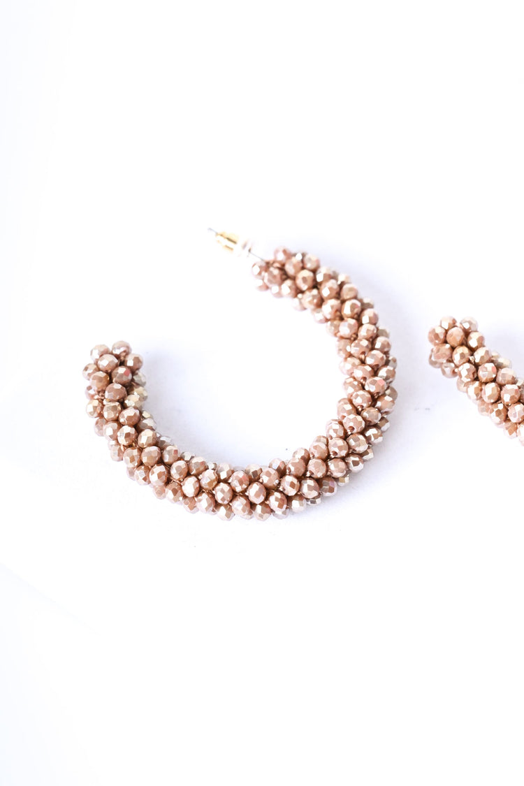 Orecchini a semicerchio con perline