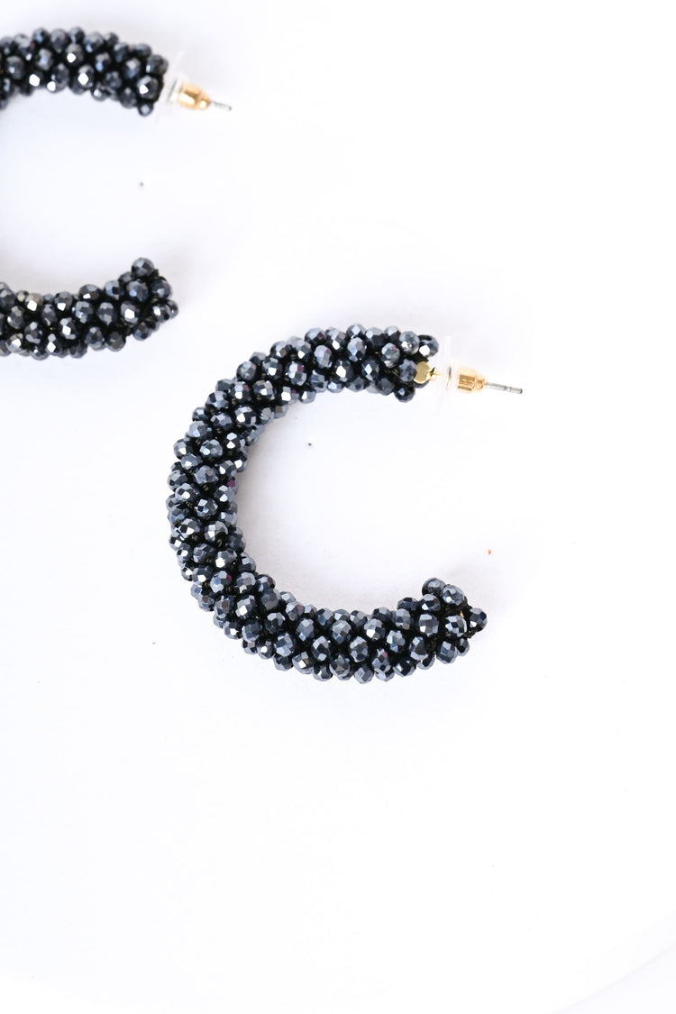 Orecchini a semicerchio con perline