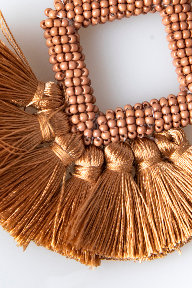 Orecchini a rombo con nappine