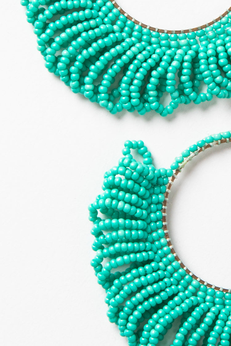 Orecchini a cerchio con perline