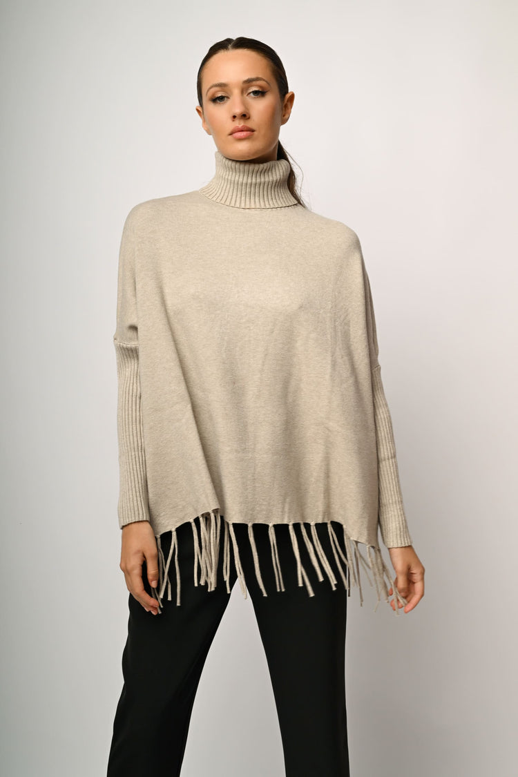 Dolcevita oversize con frange