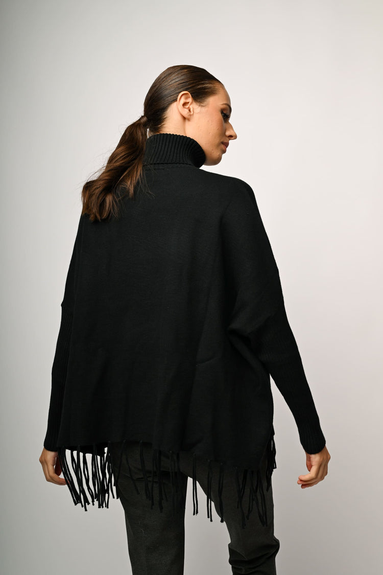 Dolcevita oversize con frange