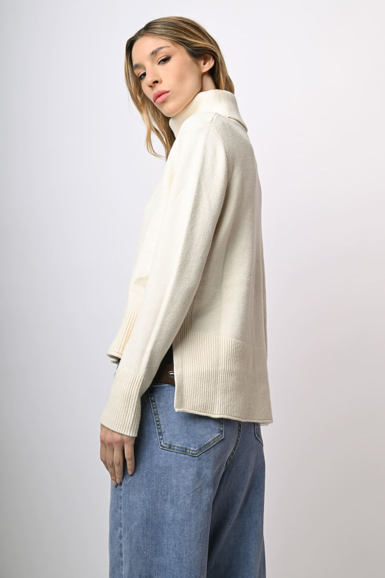 Dolcevita asimmetrico con spacchetti