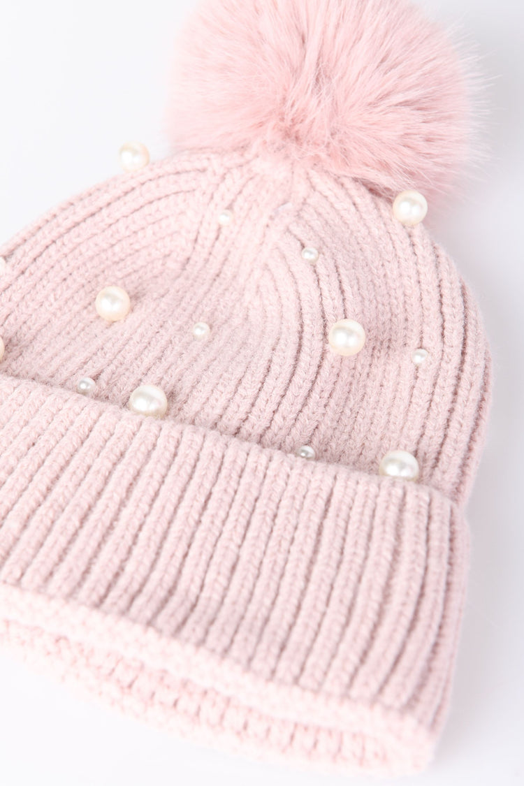 Berretto con pompon e perle