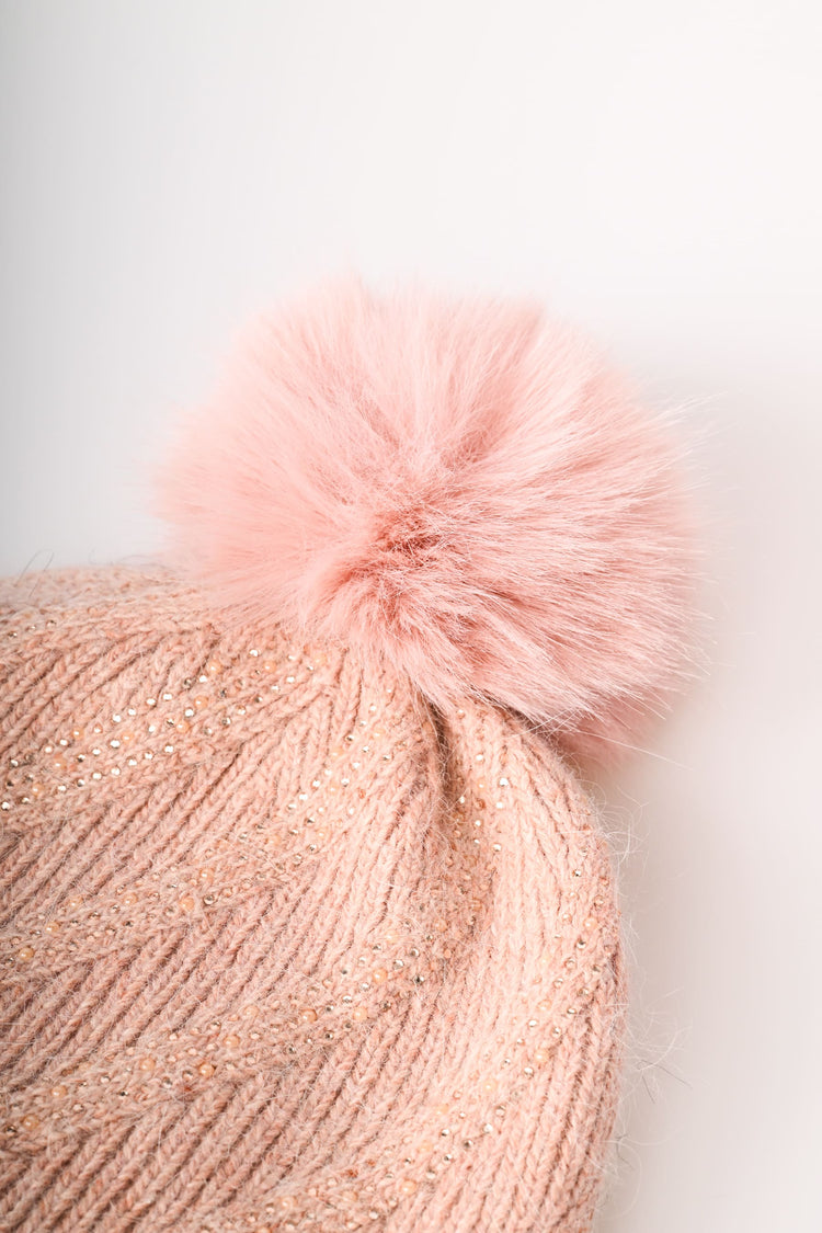 Berretto con pompon e strass