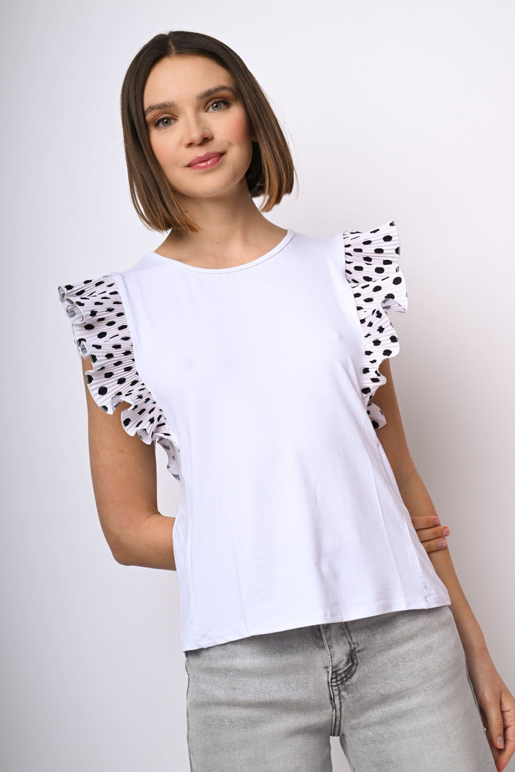 Top con rouches a stampa pois