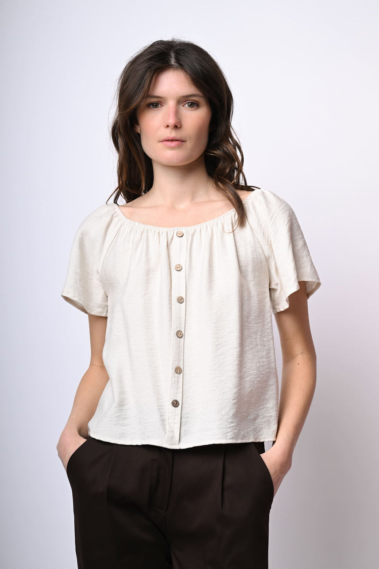 Top a spalle scoperte con bottoni