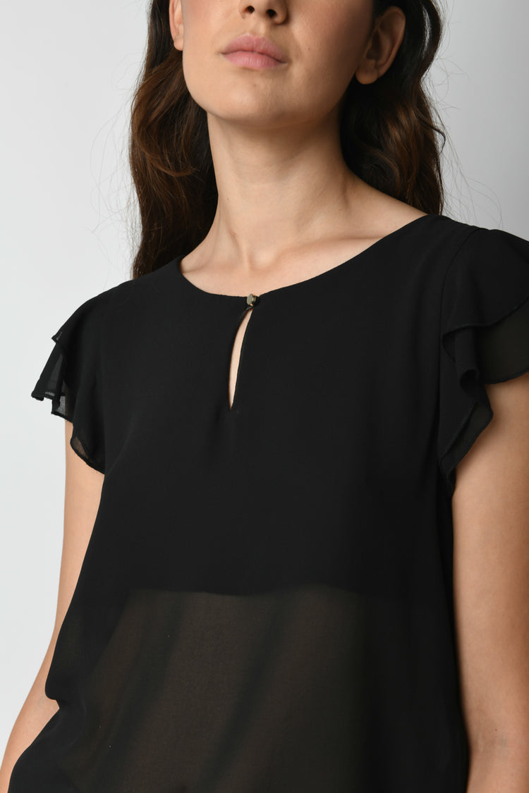 Top con volants alle maniche