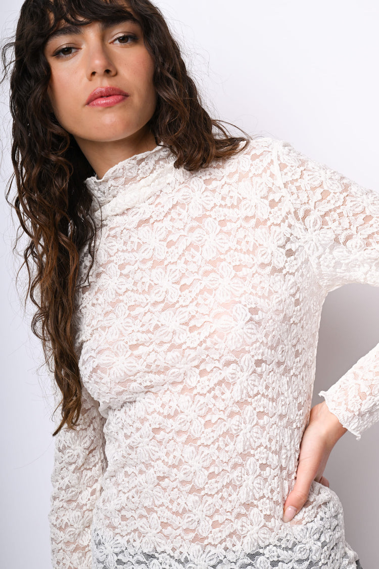 Top in pizzo con scollo a cratere