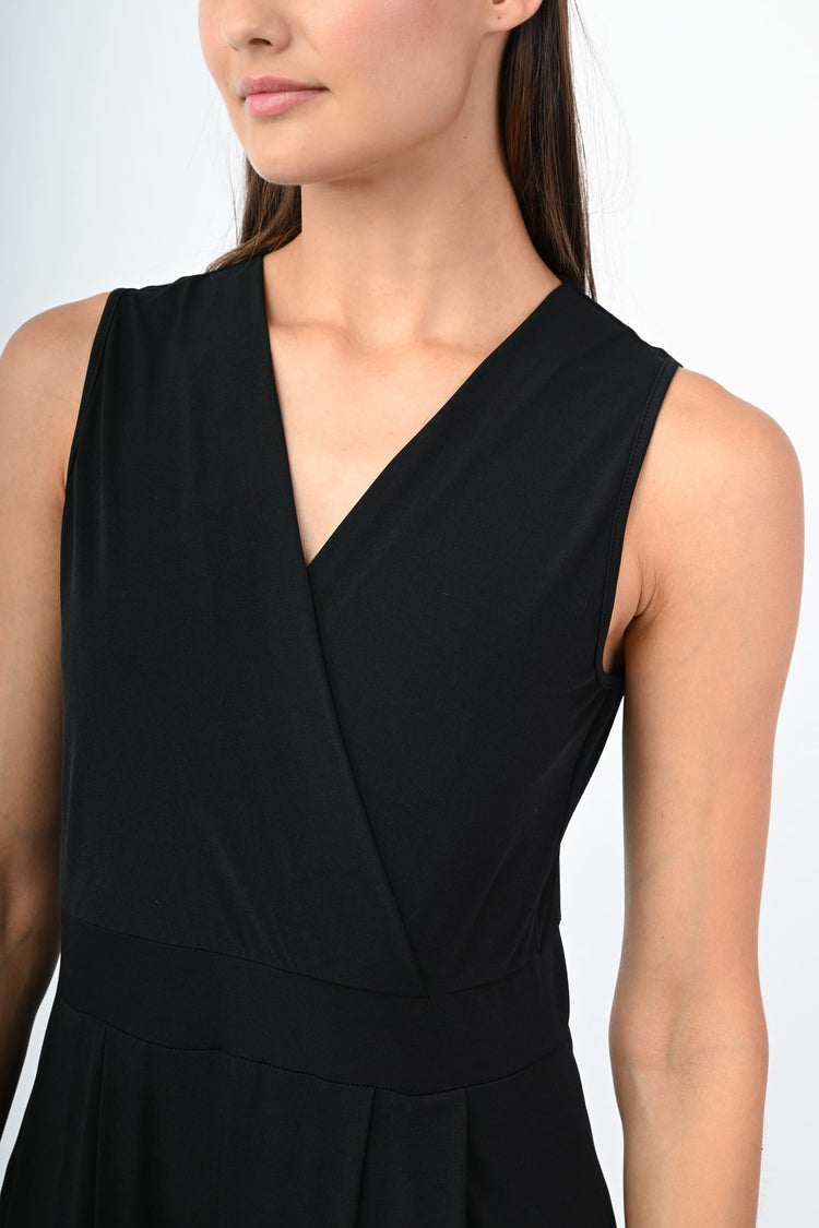 Tuta palazzo con scollo incrociato