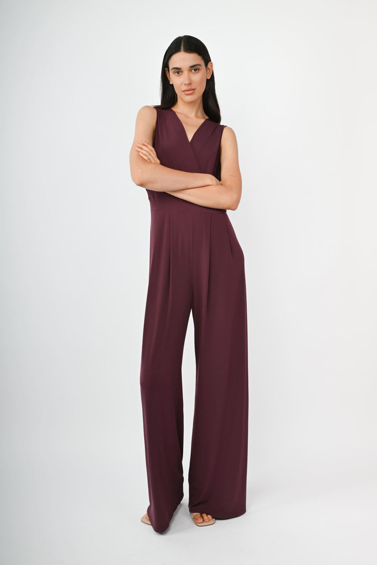 Tuta con scollo a V incrociato