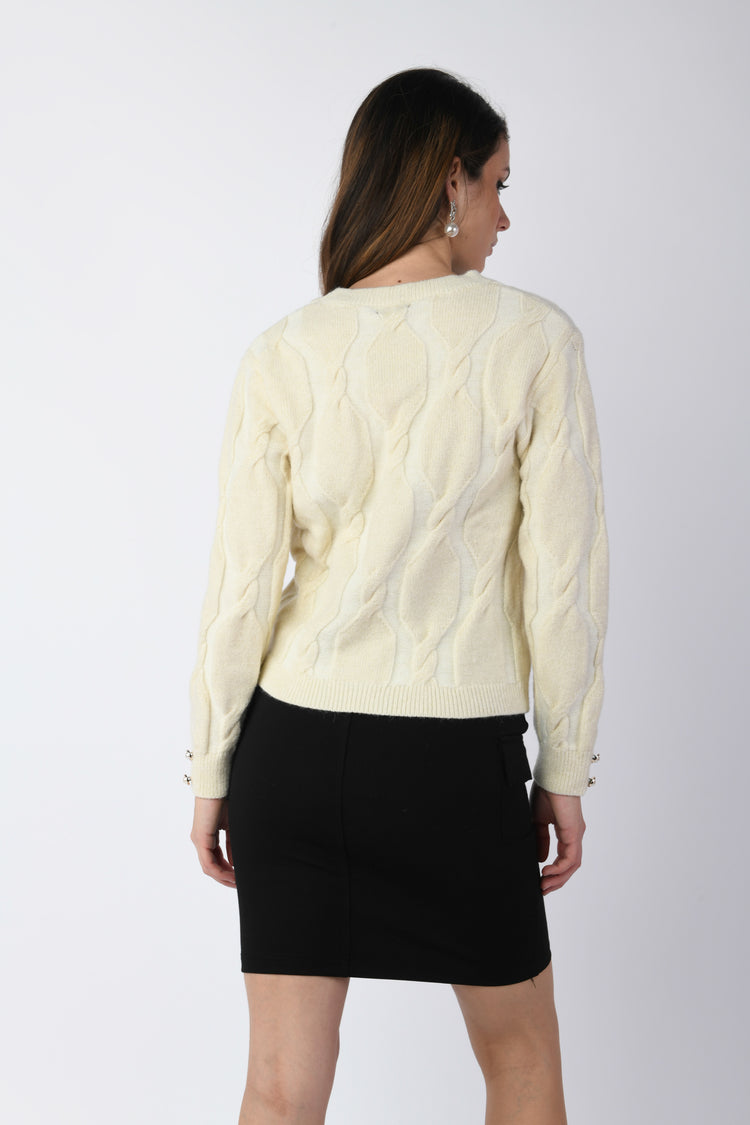 Pull con motivo a trecce