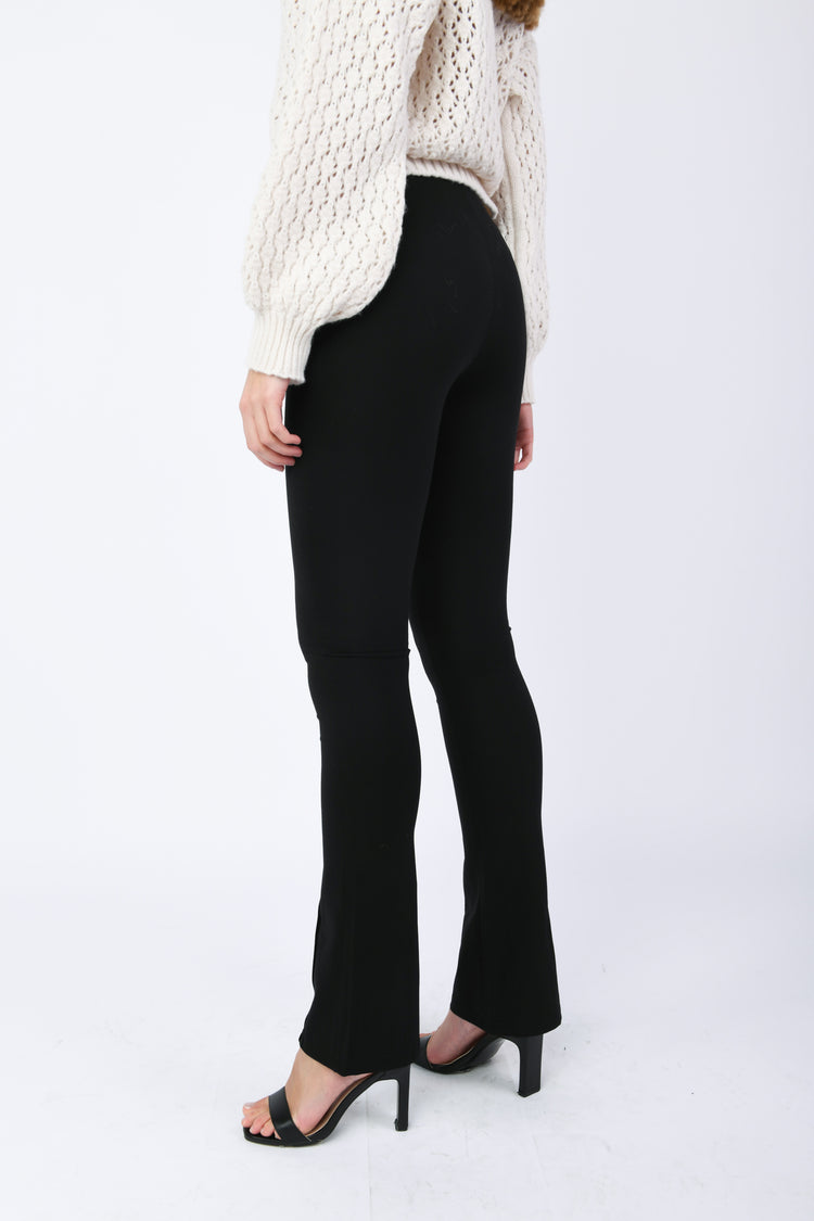 Pantaloni svasati in cotone stretch