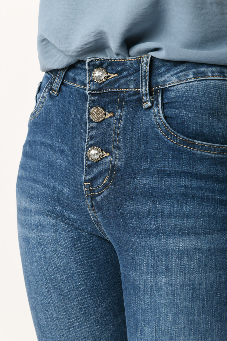 Jeans con bottoni gioiello