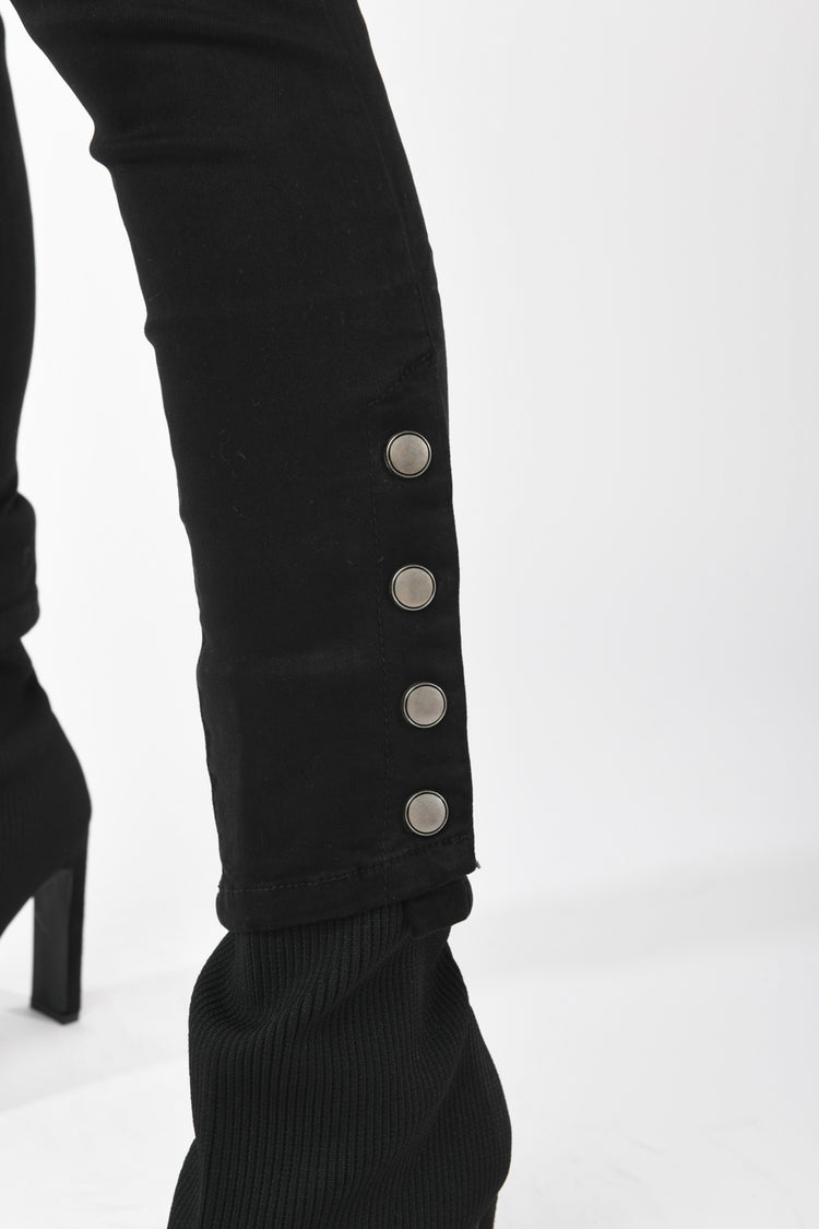 Jeans skinny con bottoni