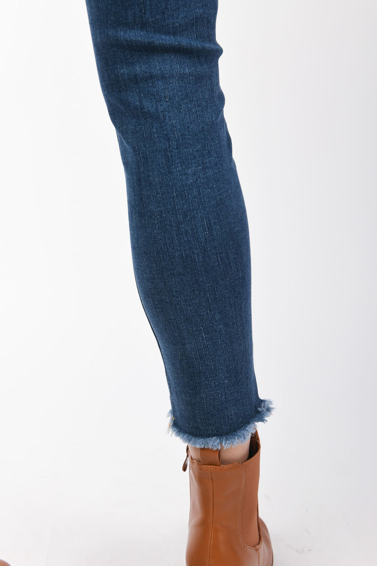 Jeans skinny con bottoni gioiello
