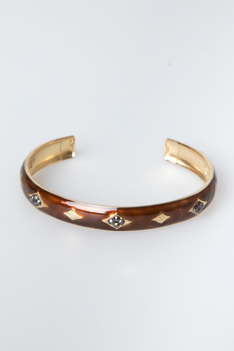 Bracciale rigido con decorazioni