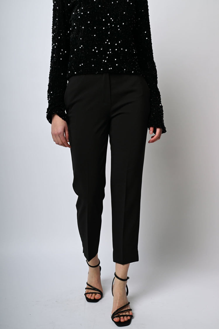 Pantaloni a sigaretta con piega stirata