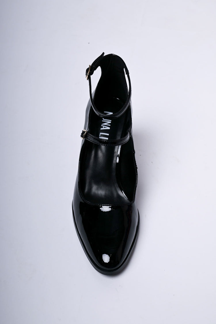 Décolleté in vernice con doppi cinturini