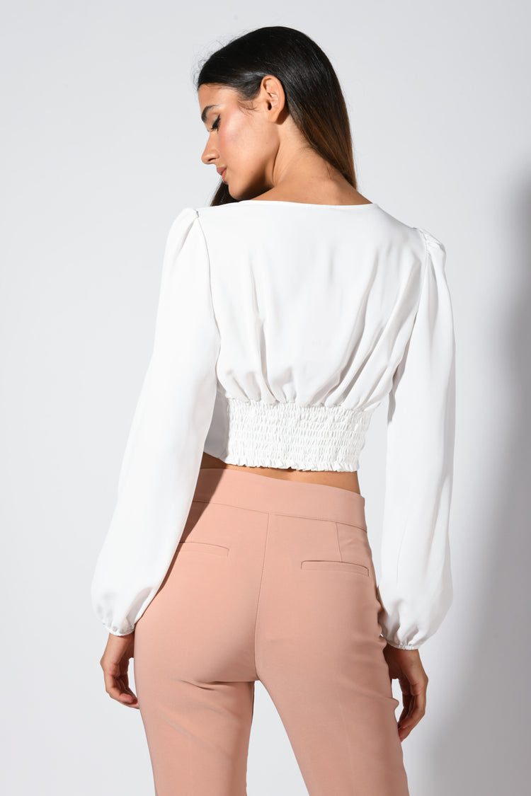 Top crop con scollo a V