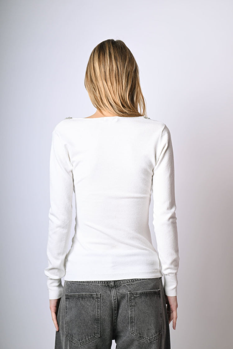 Pull a incrocio con decorazione gioiello