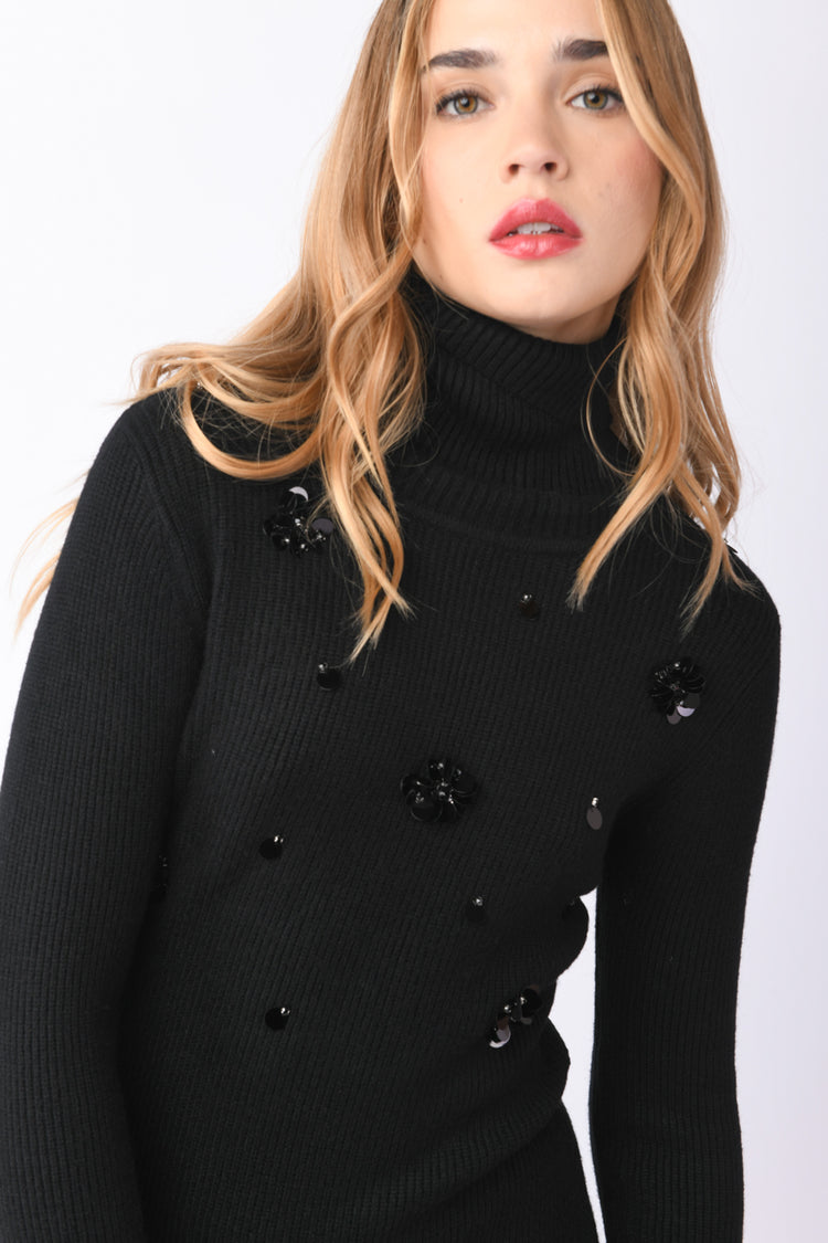 Mini abito con decorazioni gioiello