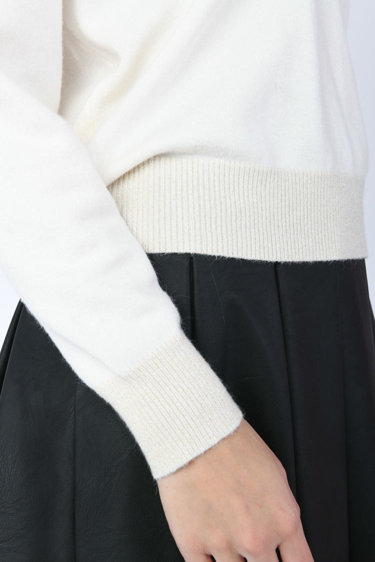 Pull con profili in maglia lurex