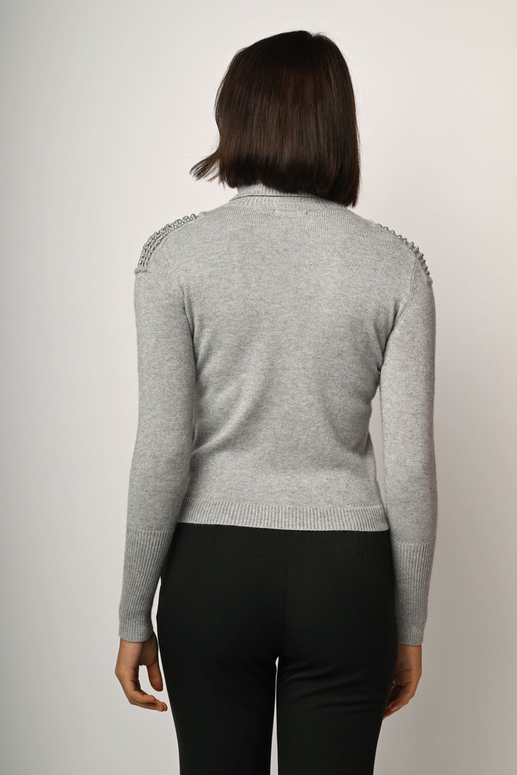 Dolcevita con perline sulle spalle