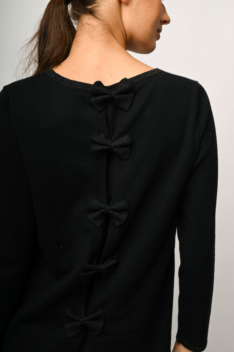 Pull con fiocchi sul retro