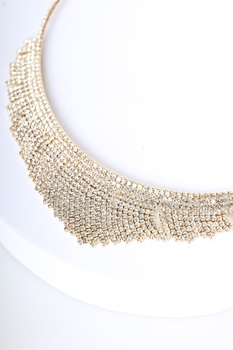 Collana rigida con decorazione strass