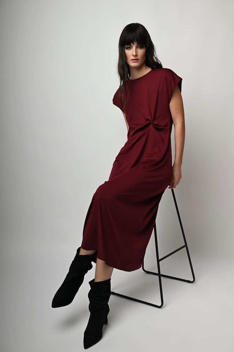 Abito lungo con drappeggio laterale