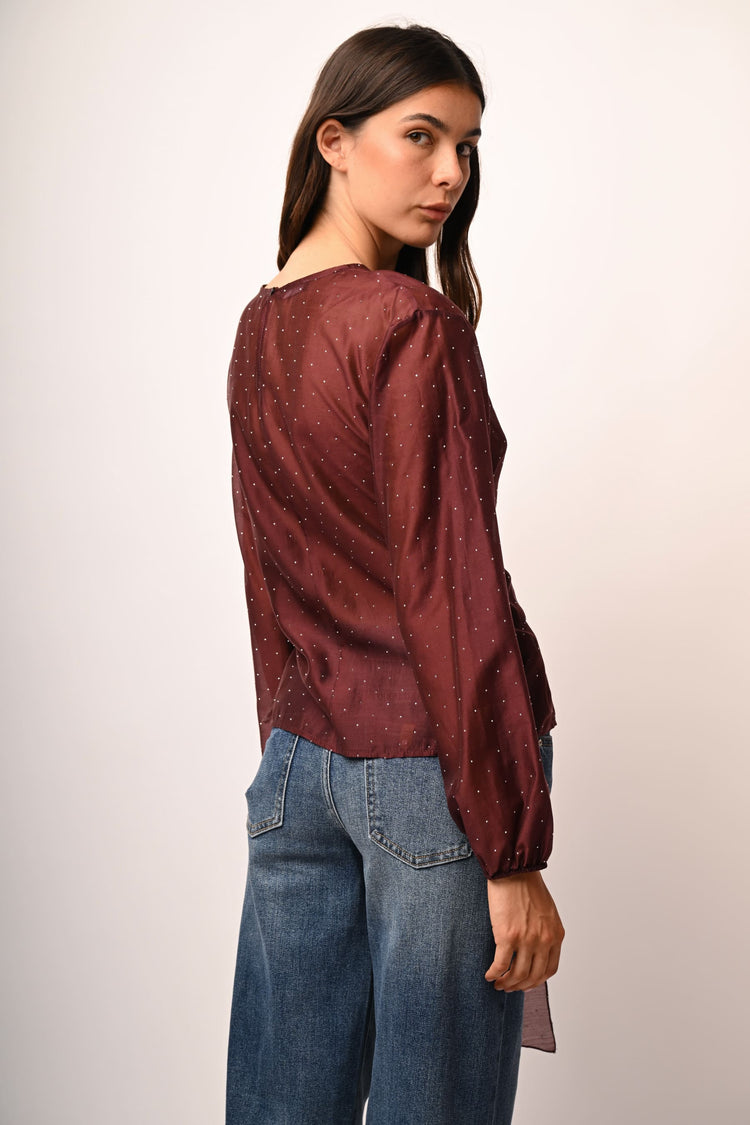 Blusa in mussola con fiocco e strass