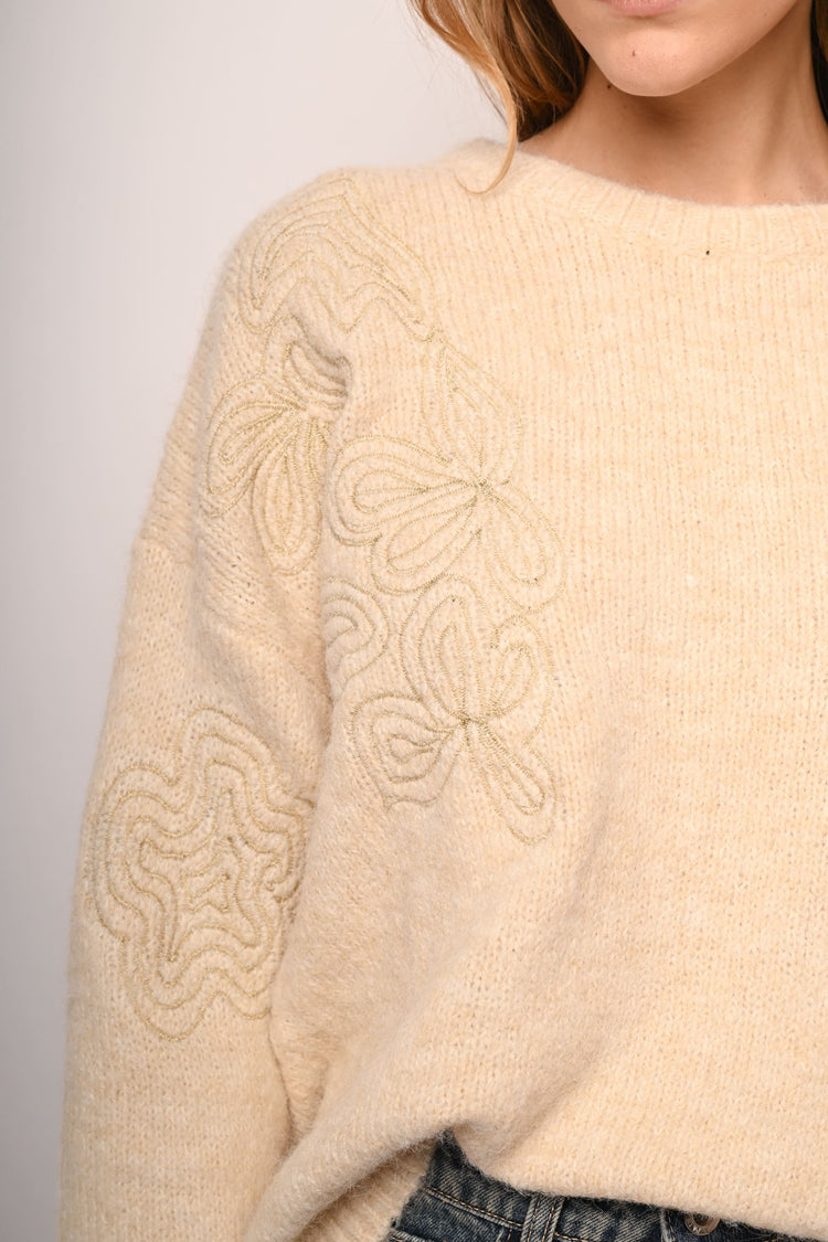 Pull con ricami