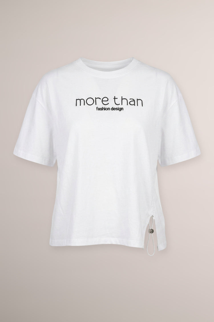 T-shirt bianca con scritta in paillettes