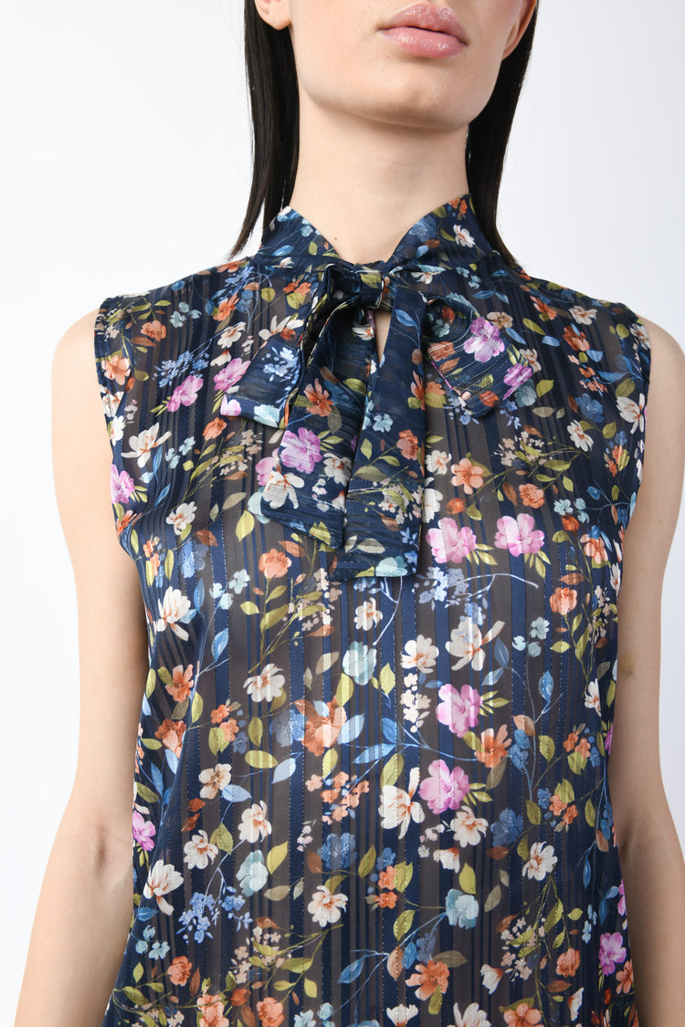 Top a stampa floreale lamé