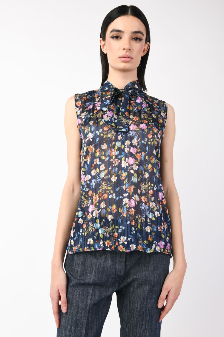 Top a stampa floreale lamé