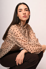 Blusa con fiocco e stampa a pois