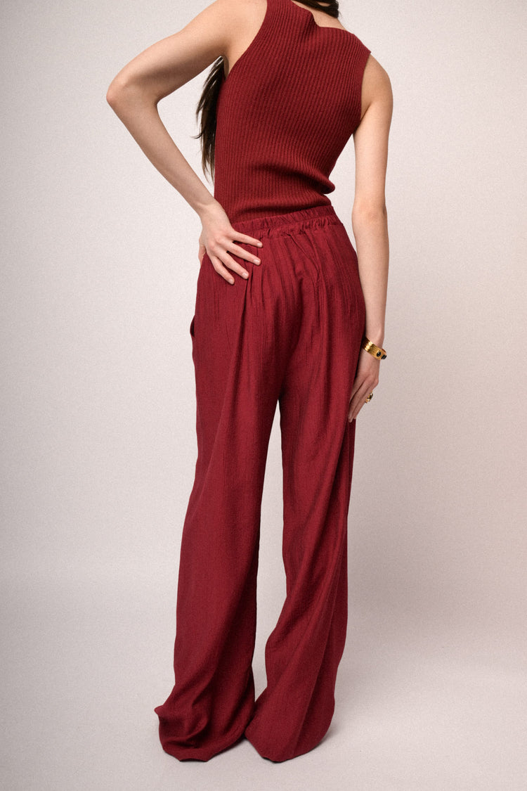 Pantaloni palazzo in viscosa rossa con cintura