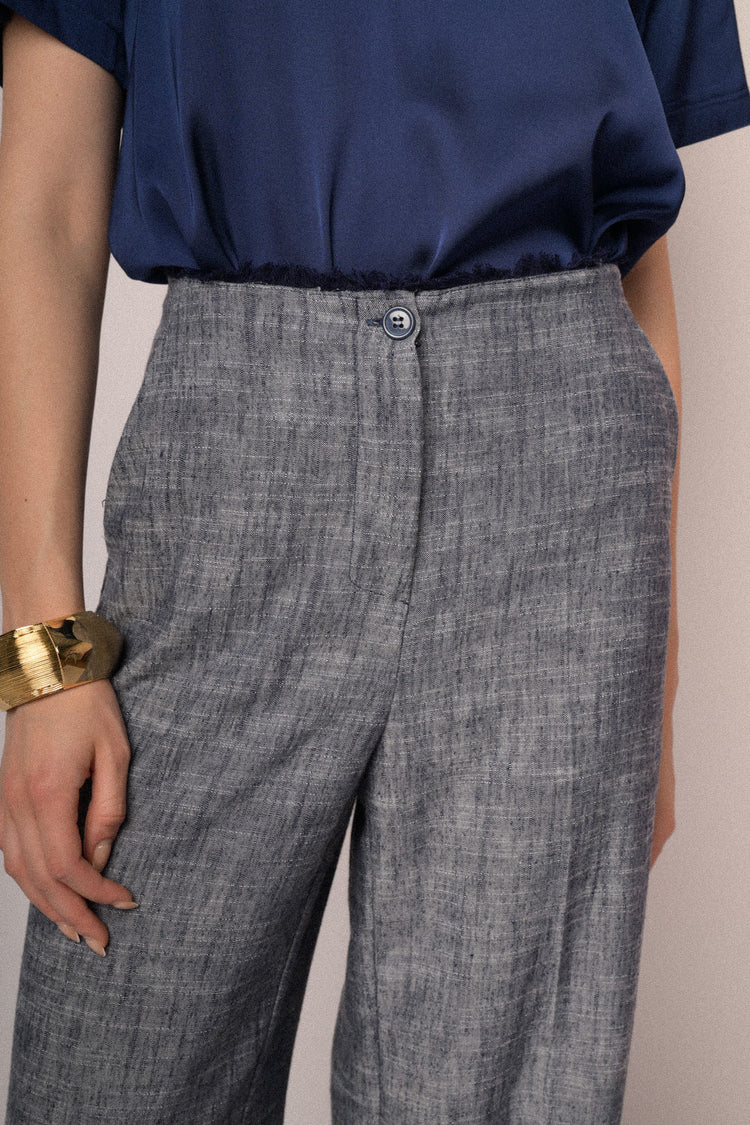 Pantaloni palazzo con vita sfrangiata blu mélange