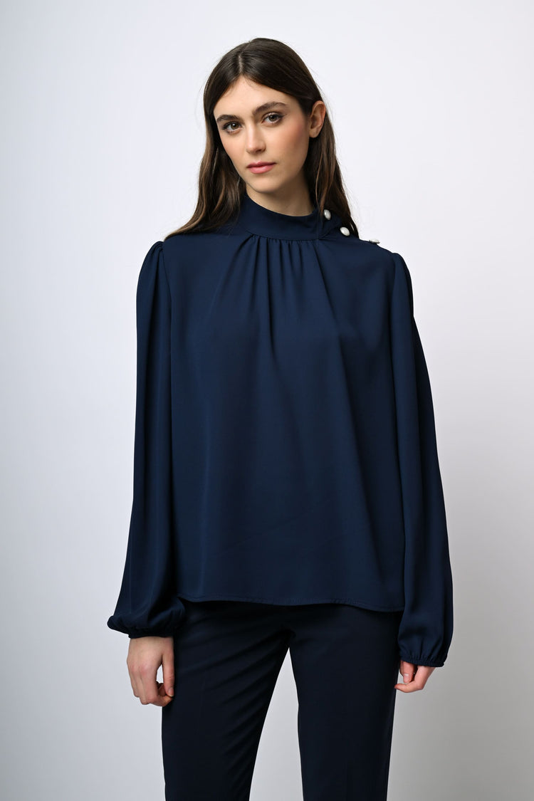 Blusa con bottoni sulla spalla