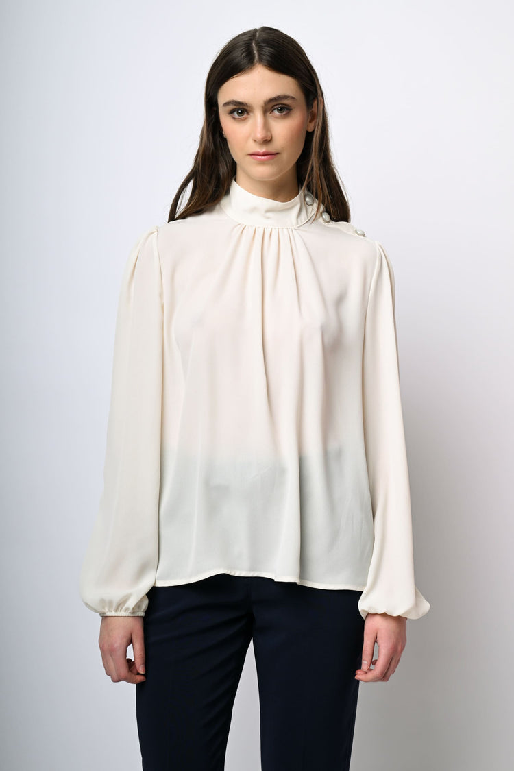 Blusa con bottoni sulla spalla