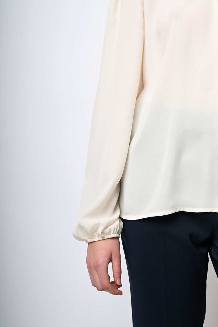 Blusa con bottoni sulla spalla