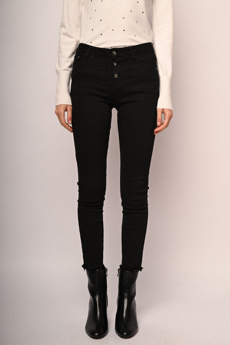 Jeans skinny con bottoni gioiello