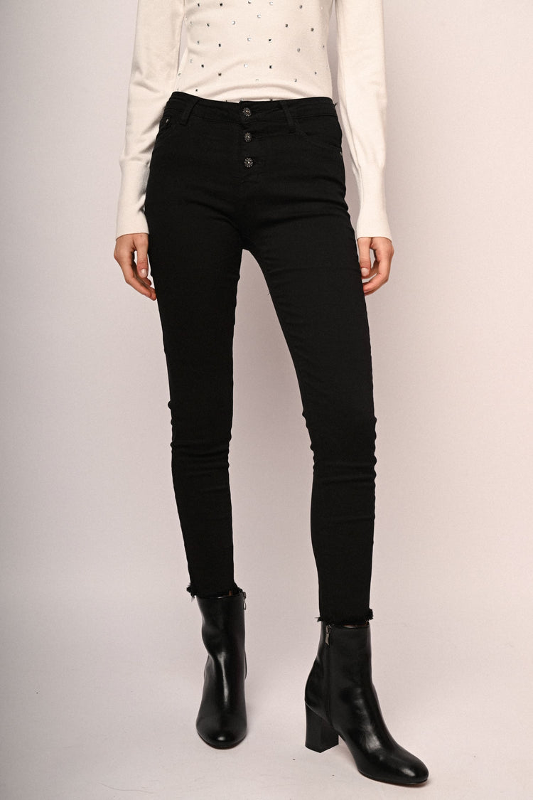 Jeans skinny con bottoni gioiello
