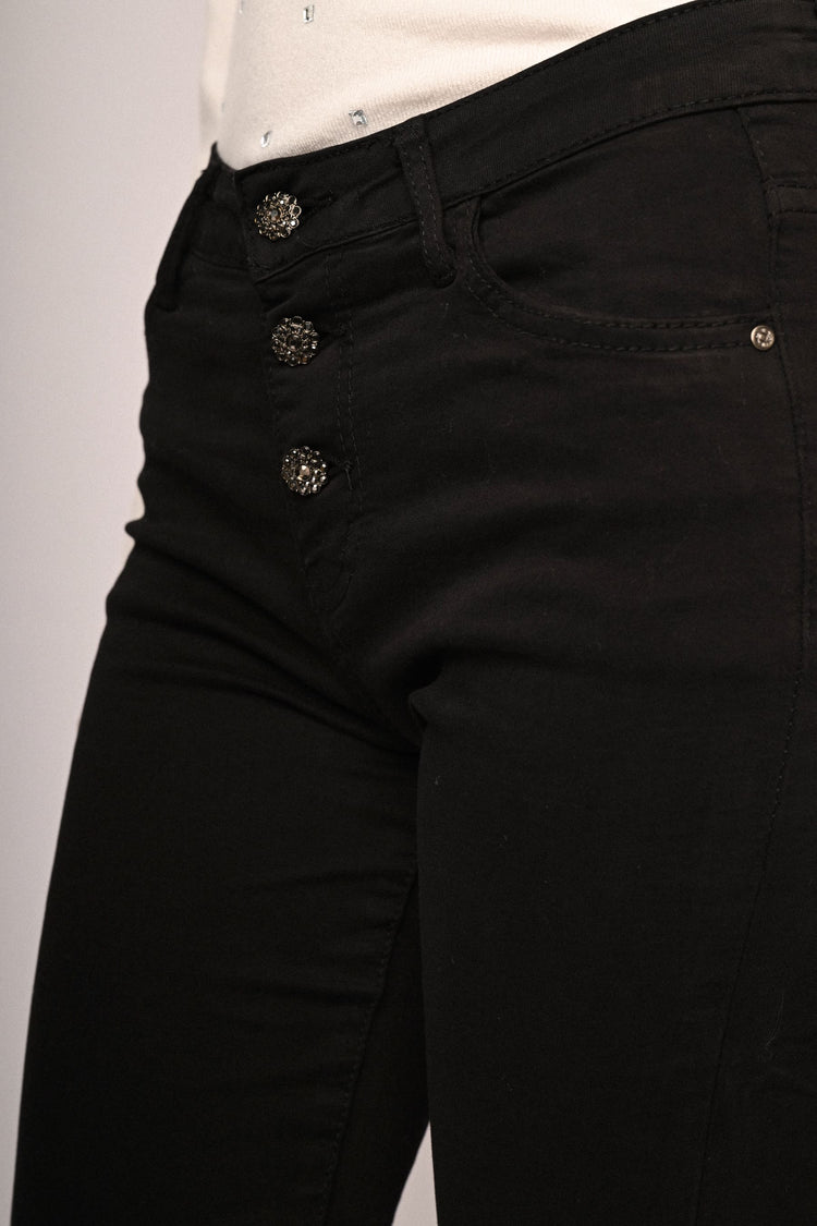 Jeans skinny con bottoni gioiello