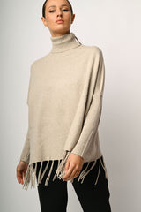 Dolcevita oversize con frange