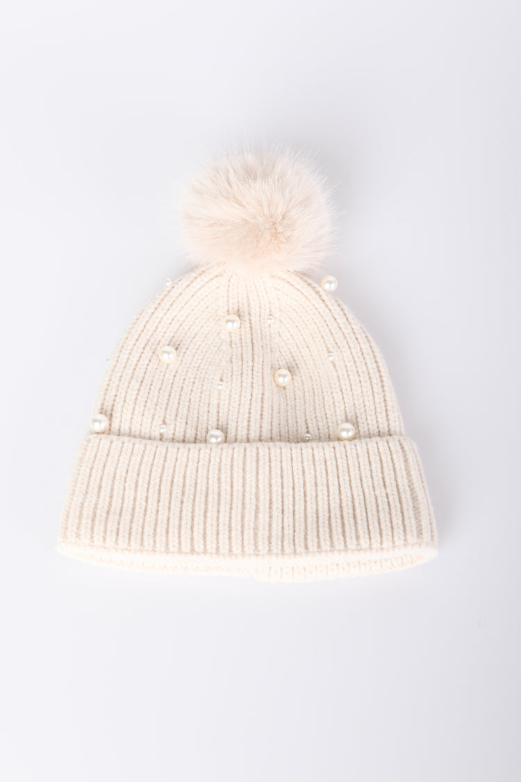 Berretto con pompon e perle