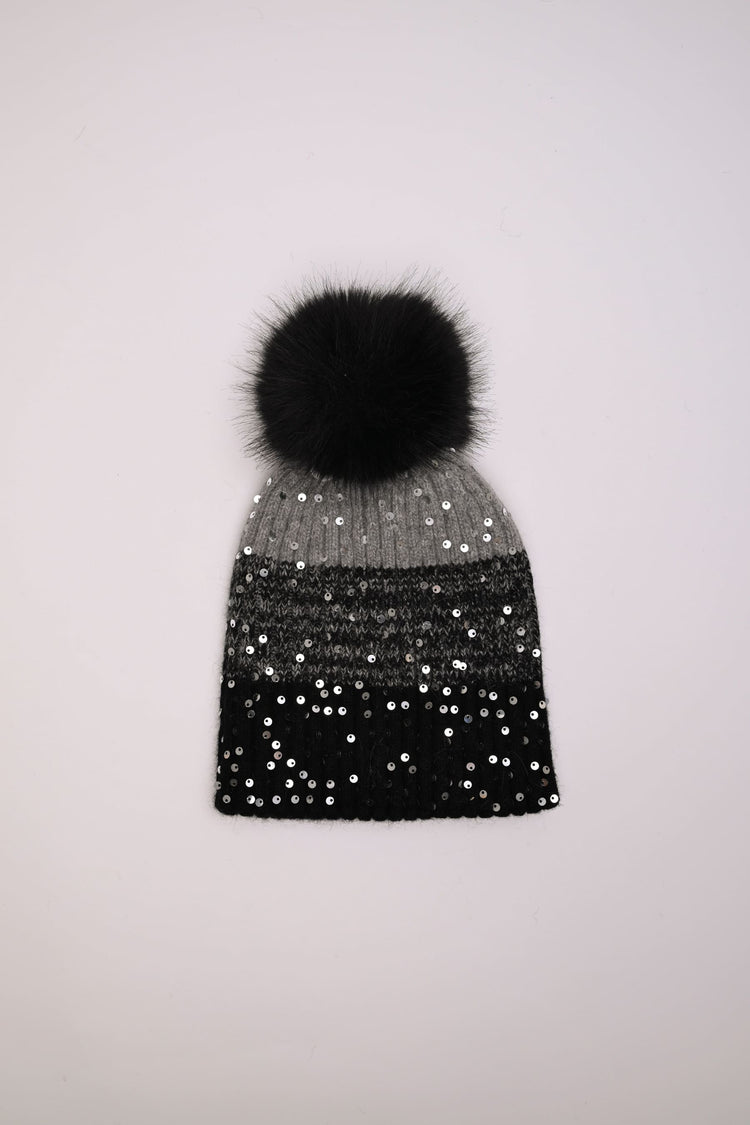 Berretto color-block con paillettes e pompon